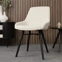 Eetkamerstoel Nena-Isa bouclé beige - zwart onderstel