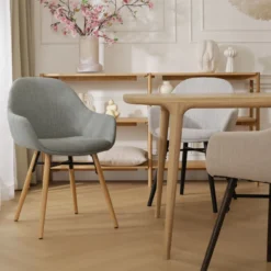 Eetkamerstoel Nena-Mae bouclé beige - zwart onderstel