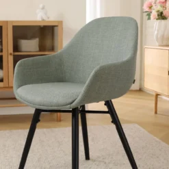 Eetkamerstoel Nena-Mae licht groen - zwart houten poten