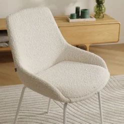 Eetkamerstoel Nora-Isa bouclé beige - wit onderstel