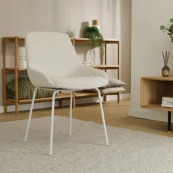 Eetkamerstoel Nora-Isa bouclé beige - wit onderstel