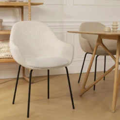 Eetkamerstoel Nora-Mae bouclé beige - zwart onderstel