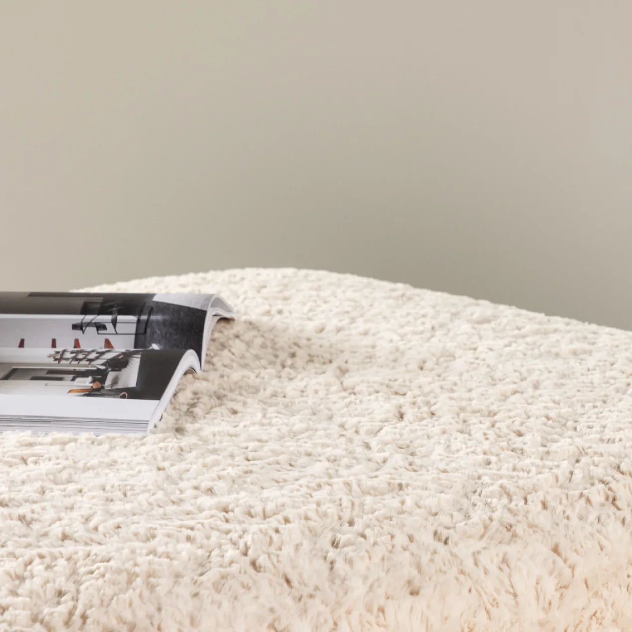 Vierkante schapenvacht poef Erla Beige