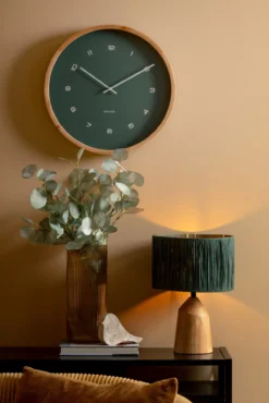 Wall clock Modesta light wood jungle green