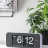 Wall clock Wide Flip orange casing, black dial
